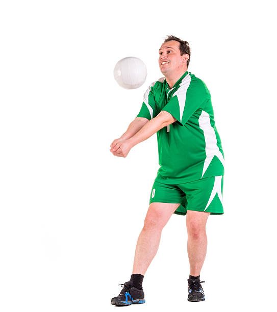 istock Mature man dressed in green sportswear posing 534314706