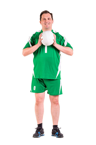 istock Mature man dressed in green sportswear posing 534314728