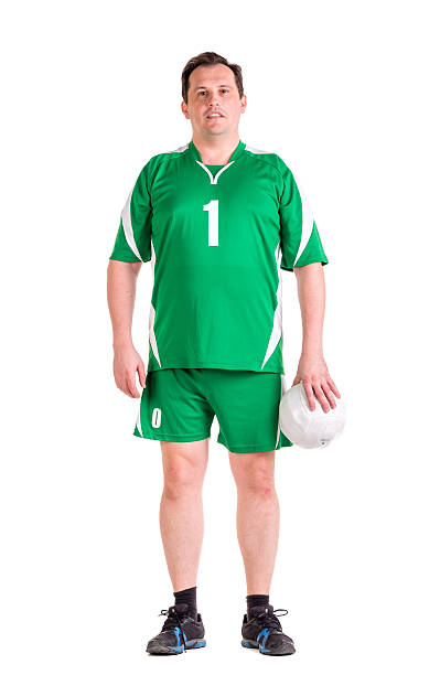 istock Mature man dressed in green sportswear posing 534314958