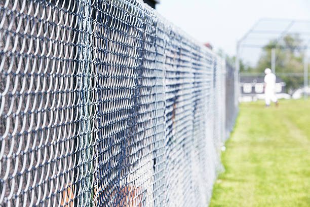istock Baseball Playing Field Chainlink Fence Boundary 534316288