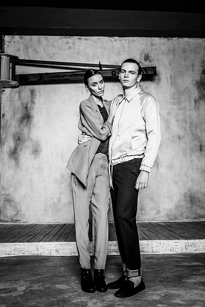 istock Young couple posing over painted background 534316296