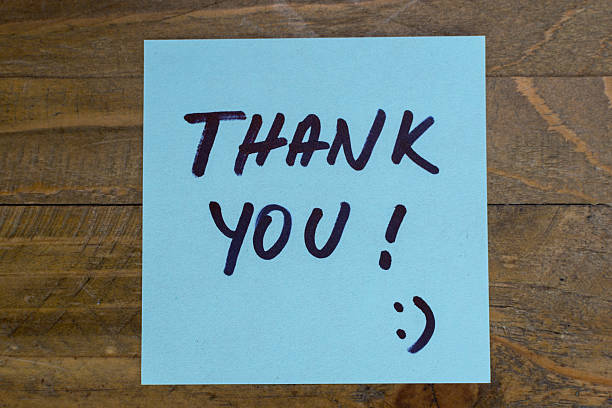 istock Thank you written on colored paper 534316516