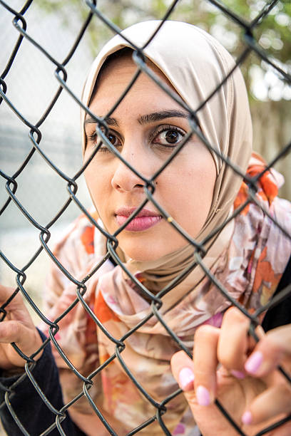 istock Sad refugee Middle eastern woman (Real People) 534316586