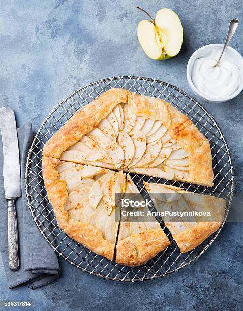 Apple Galette Pie Tart With Cinnamon On Cooling Rack Stock Photo - Download Image Now