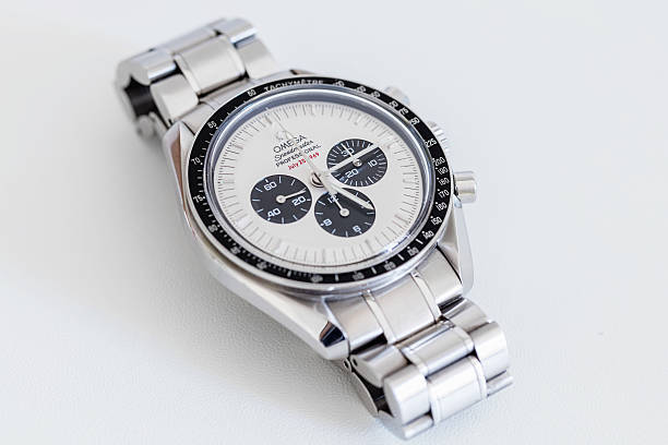 Omega Speedmaster Professional SU 145.0227 Apollo XI Watch Stuttgart, Germany - May 26, 2016: Omega Speedmaster Professional Apollo XI 35th Anniversary Chronograph with rare White Dial, black bezel and steel bracelet. The Speedmaster Apollo XI 35th Anniversary: Ref. SU 145.0227 is a very rare one, with its white ‘Panda’ Dial – a white face with black sub-counters. Under the mention Professional at 12 is written in red “July 20, 1969”. swiss watches stock pictures, royalty-free photos & images