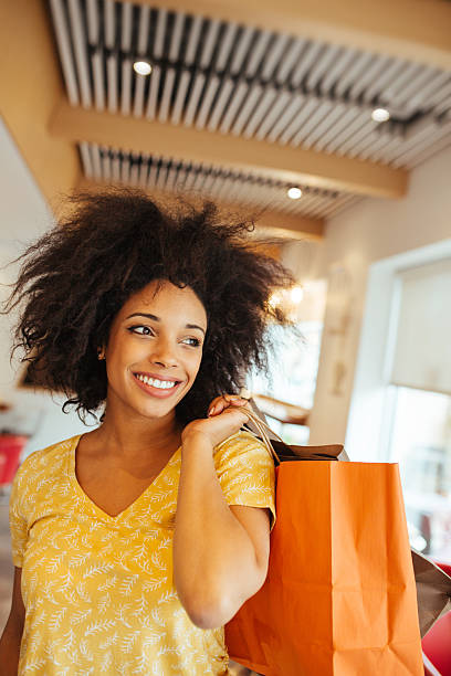 istock Happy customer with shopping bags 534333668