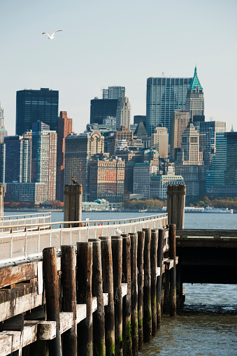 New York, USA - October 31, 2010: View of New York City from a wooden pier across the water