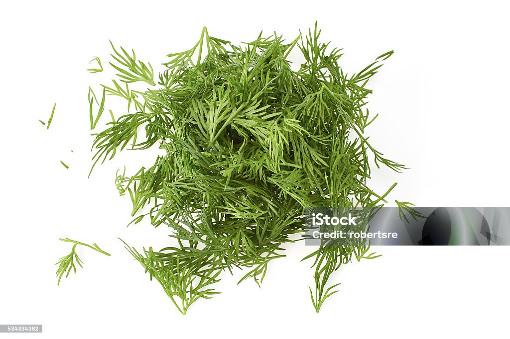 Chopped fresh dill on white Chopped fresh dill isolated on white background Branch - Plant Part Stock Photo