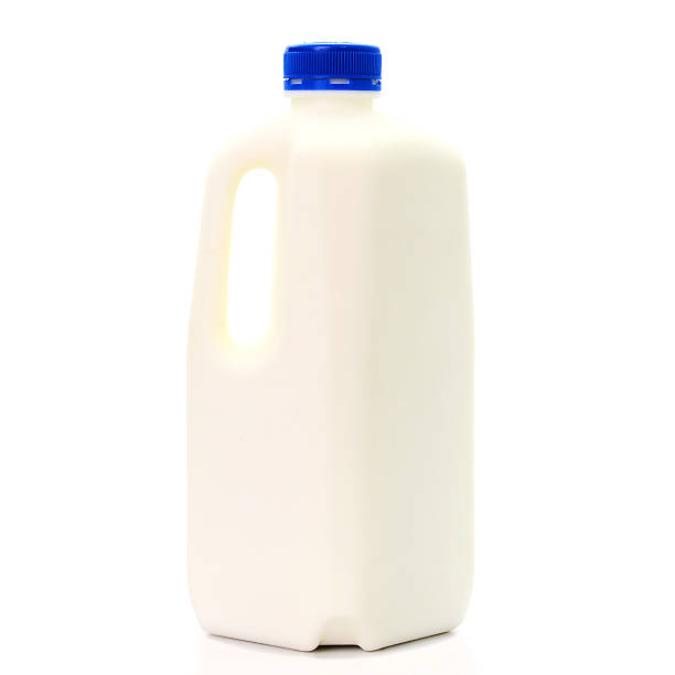 istock Milk Bottle with blud Cap Isolated on White Background 534335418