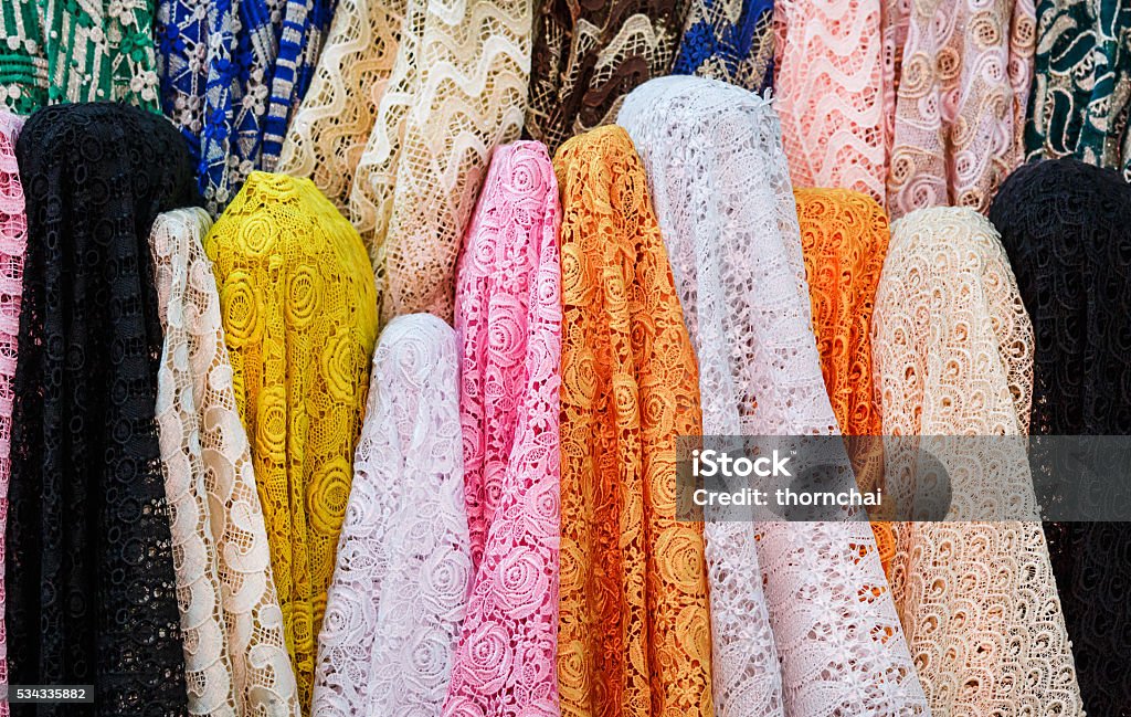 Lacework Cloth Many color lace cloth display in fabric shop. Arts Culture and Entertainment Stock Photo