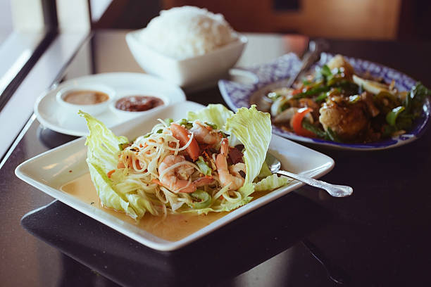 Green papaya salad. Thai dinner. stock photo