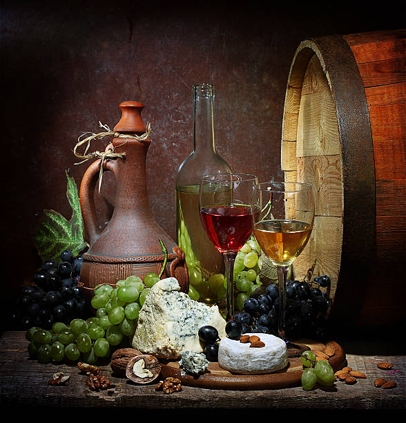 istock Red and white wine with cheese, grapes and nuts 534361845