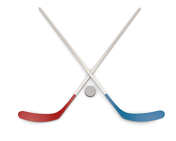 istock Ice Hockey puck and sticks. 534362437