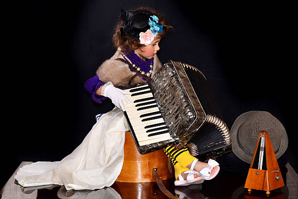 istock Cute baby with an accordion 534362759