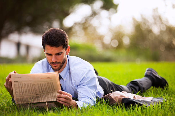 istock Businessman reading the newspaper 534364171