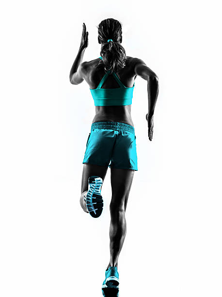 istock woman runner running jogger jogging rear view silhouette 534364479