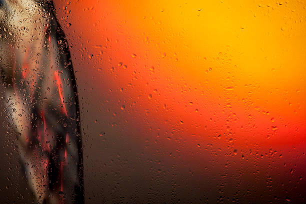 istock look at the water pouring through the glass with raindrops 534364659