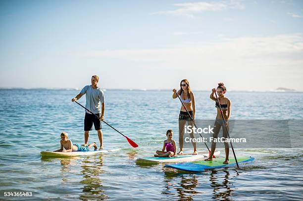 Sup Stand Up Paddleboarding Family Stock Photo - Download Image Now - Family, Paddleboarding, Hawaii Islands