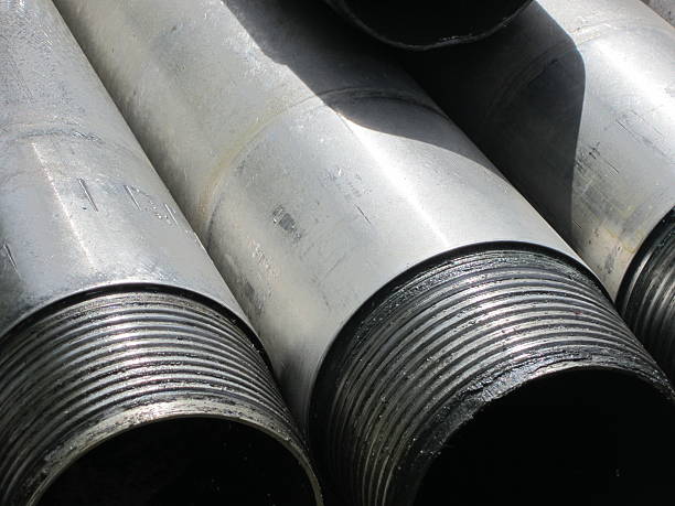 istock Closeup of threaded steel tubing 534366255