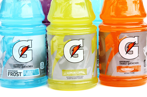 West Palm Beach, USA - June 18, 2014: Assortment of three different flavored Gatorade sports drinks. Gatorade beverages are products of PepsiCo. Flavors shown are Orange, Lemon-Lime and Frost.