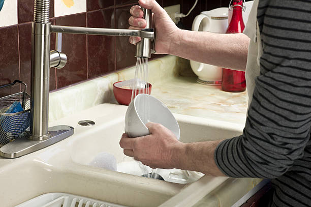 istock Senior Man Washing Dishes, Old Fashioned Sink. 534368449