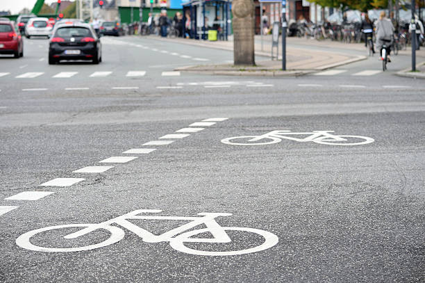 istock Bike lane and traffic 534368601