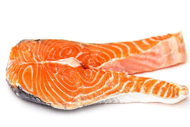 istock Raw Salmon Red Fish Steak isolated on White 534368923