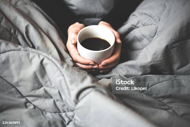 Woman Holding A Cup Of Coffee Stock Photo - Download Image Now - 2015, Adult, Alertness