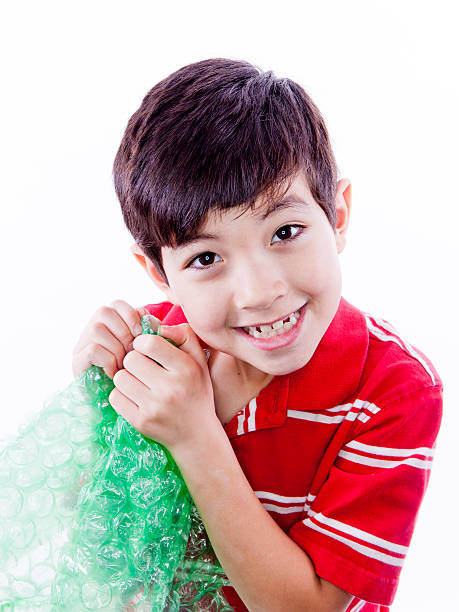 20+ Kids Popping Bubble Wrap Stock Photos, Pictures & Royalty-Free