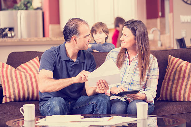 istock Couple paying monthly bills at home.  Budget. 534389646
