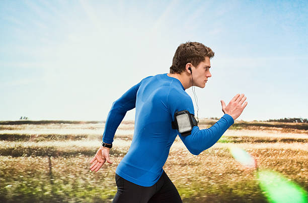 istock Male runner running outdoors 534404778