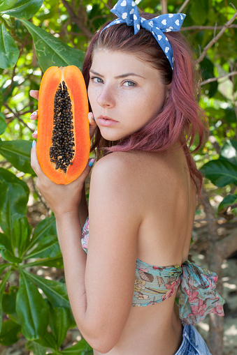 Young woman with fruit