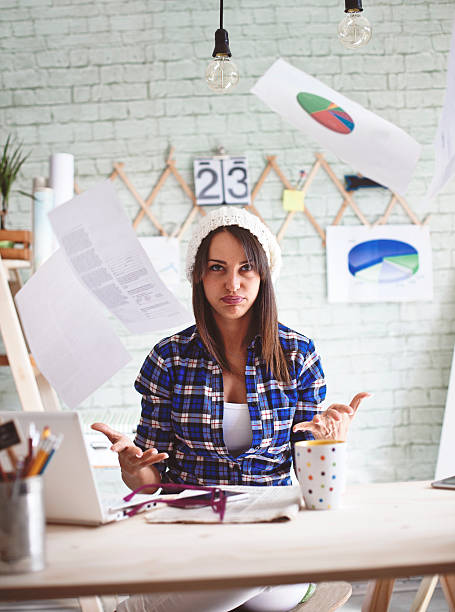 istock Business woman  throwing document in the air 534406032