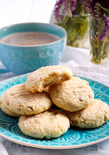 istock Coconut crunchy cookies on blue plate 534407164