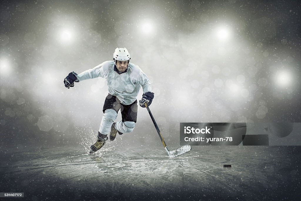 Ice hockey player on the ice, outdoors Ice Hockey Stock Photo