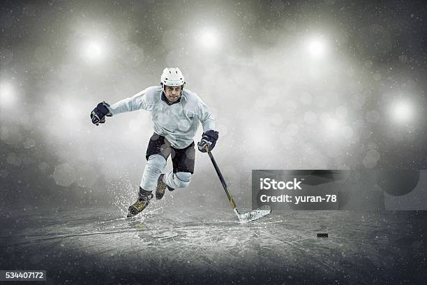 Ice Hockey Player On The Ice Outdoors Stock Photo - Download Image Now - Ice Hockey, Hockey, Goalie