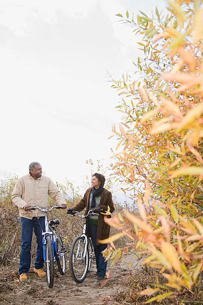 istock the couple pushing bicycles 534417617