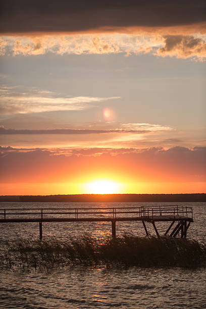 istock Wooden pier at sunset 534418021
