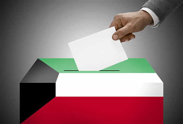 istock Ballot box painted into national flag colors - Kuwait 534419025