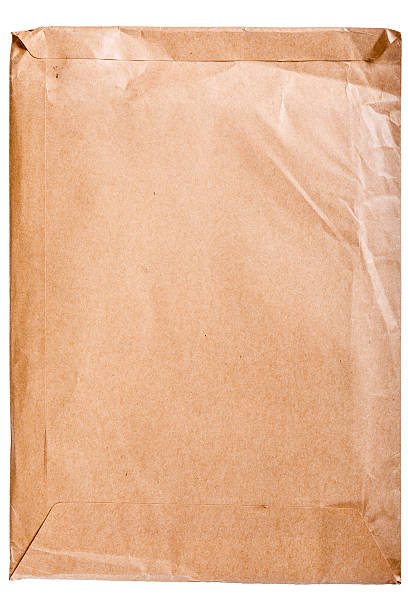 istock Yellow vintage envelope isolated on white 534421259