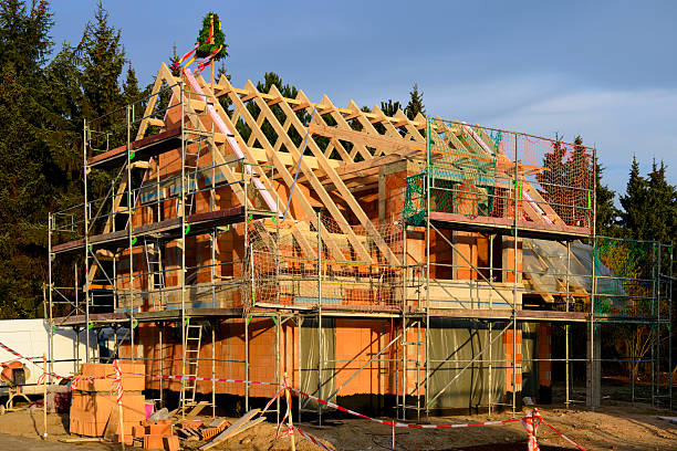 istock House construction at the edge of the forest 534422409