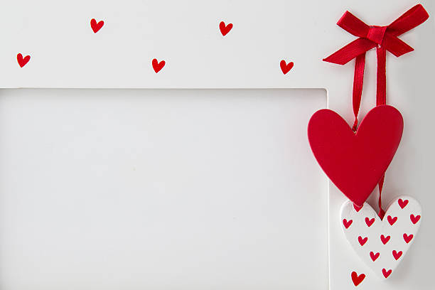 istock Decorative frame with hearts and ribbon 534423677