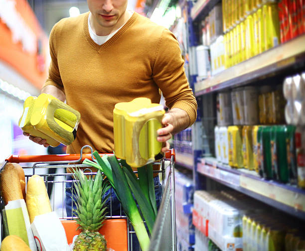istock Man buying beer in supermarket. 534424053