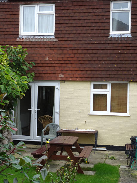 istock Typical 1980s terraced house, rendering / exterior wall tiles cladding, shingles 534424063