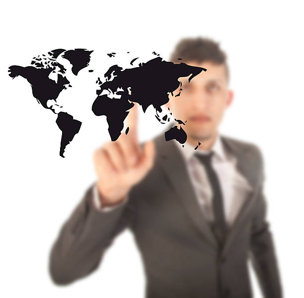 istock Young man with black world map isolated on white background 534426031
