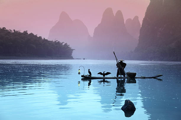 istock Fishing with cormorants birds in Yangshuo 534427981