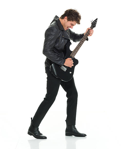 istock Excited casual man playing guitar 534449996