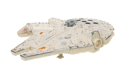Adelaide, Australia - May 26, 2016: A Millennium Falcon Vintage 1979 Star Wars Toy Vehicle isolated on a white background. Merchandise from the Star Wars universe are highly sought after collectables.