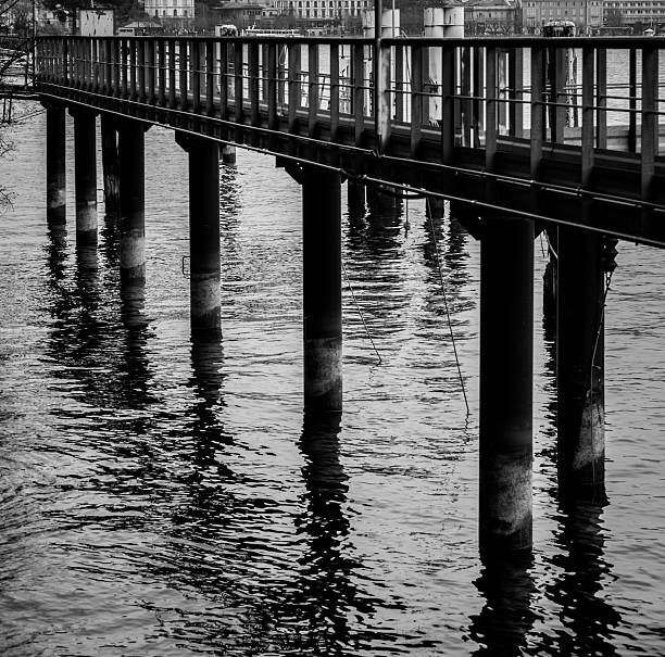 istock Pier column out of the water with shadows 534451470