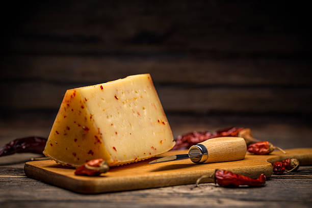 Aging artisan cheese stock photo